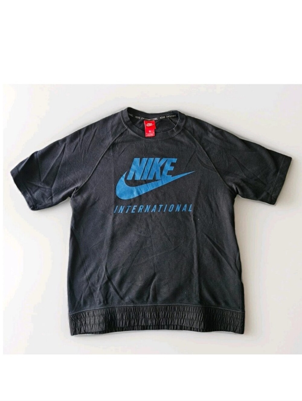 Nike International Black Crew Neck Short Sleeve Sweatshirt with Blue Logo